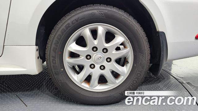 Kia Canival 2013 — photo 7