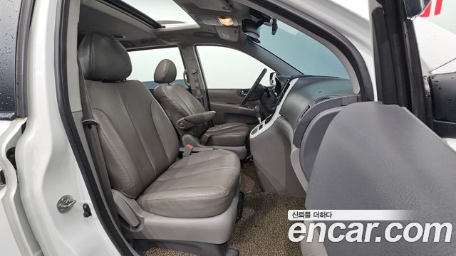 Kia Canival 2013 — photo 16