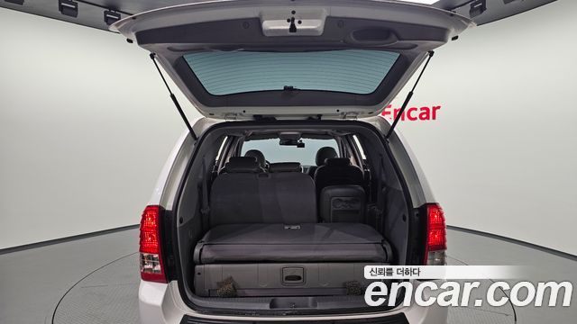 Kia Canival 2013 — photo 32