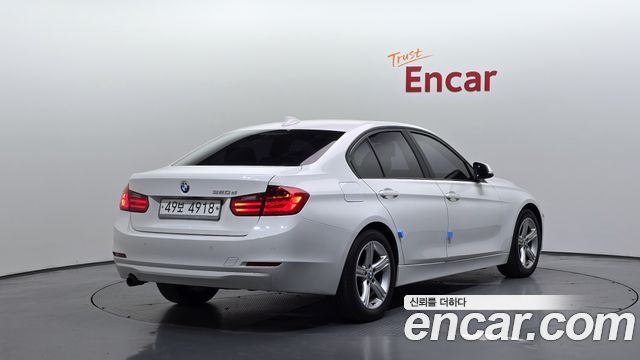 BMW 3-Series 2012 — photo 2