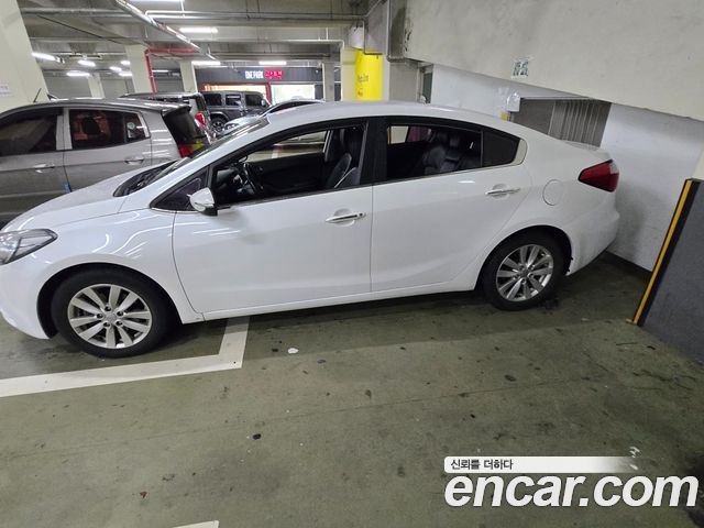 Kia K3 2014 — photo 17