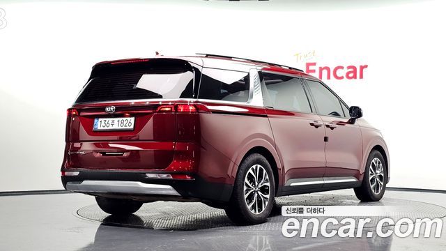 Kia Canival 2021 — photo 2