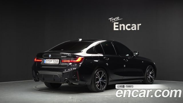 BMW 3-Series 2024 — photo 2