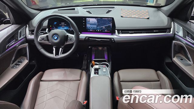 BMW iX1 2024 — photo 10