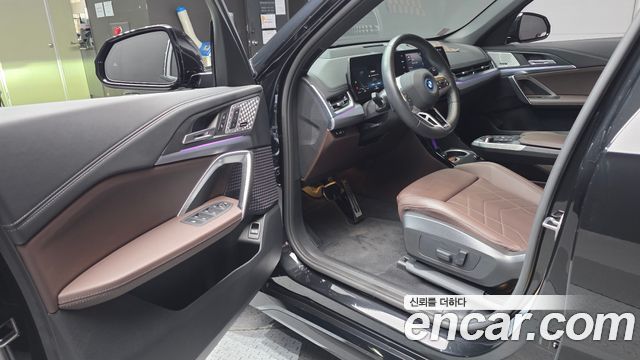 BMW iX1 2024 — photo 13