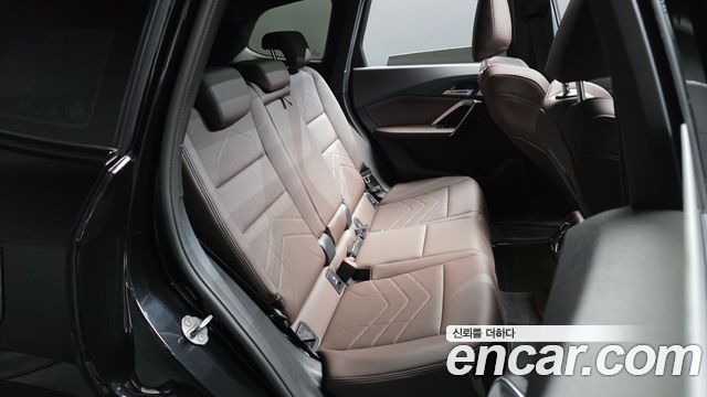 BMW iX1 2024 — photo 18
