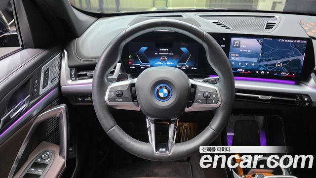 BMW iX1 2024 — photo 19