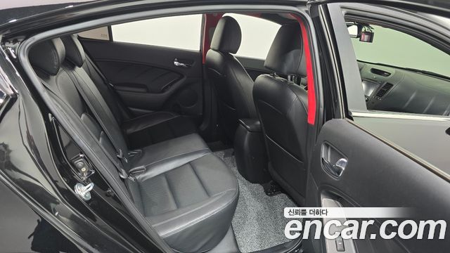 Kia K3 2013 — photo 17