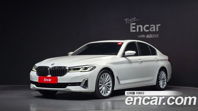 BMW 5-Series 2023 — photo 1