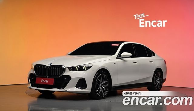 BMW 5-Series 2024 — photo 1
