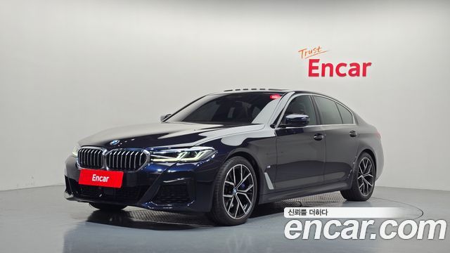 BMW 5-Series 2023 — photo 1