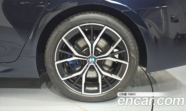 BMW 5-Series 2023 — photo 7