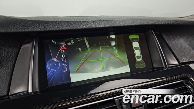 BMW 5-Series 2014 — photo 21
