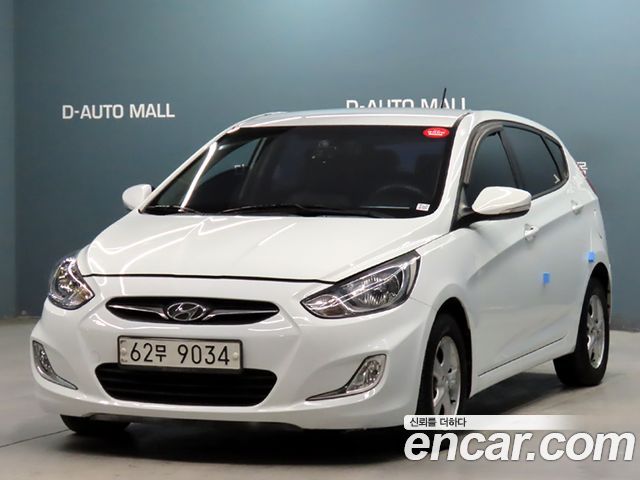 Hyundai Accent 2012 — photo 1