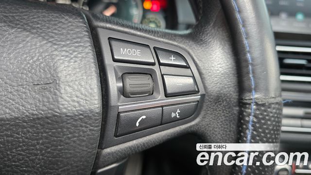 BMW 5-Series 2013 — photo 28