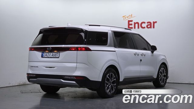 Kia Canival 2021 — photo 2
