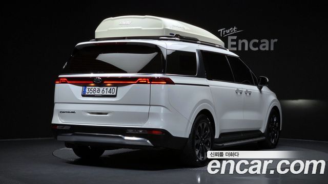 Kia Canival 2021 — photo 2