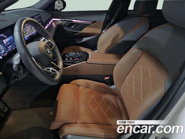 BMW 5-Series 2024 — photo 10