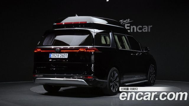 Kia Canival 2021 — photo 2