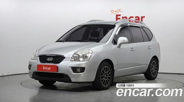 Kia Carens 2012 — photo 1