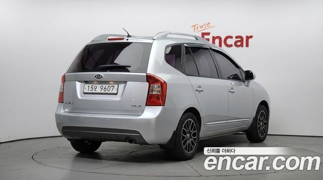 Kia Carens 2012 — photo 2