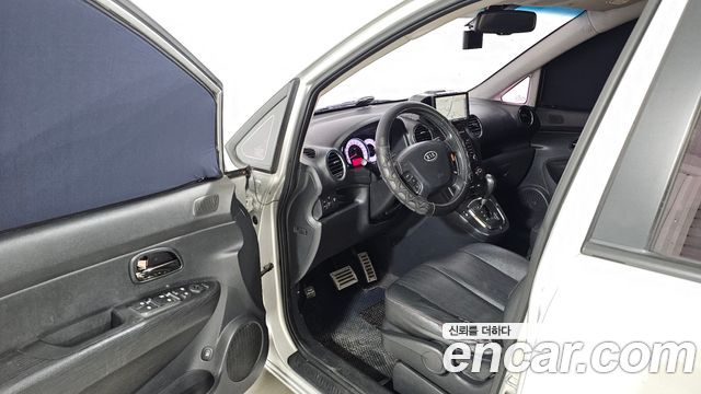 Kia Carens 2012 — photo 10