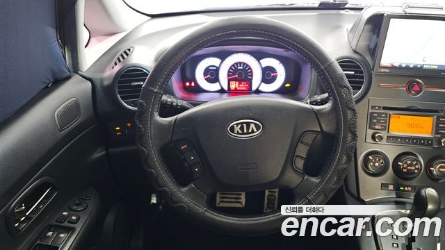 Kia Carens 2012 — photo 13