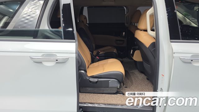 Kia Canival 2023 — photo 12