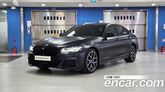 BMW 5-Series 2023 — photo 1