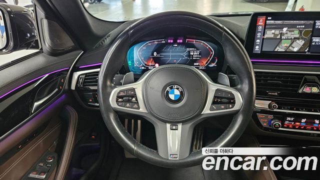 BMW 5-Series 2023 — photo 11