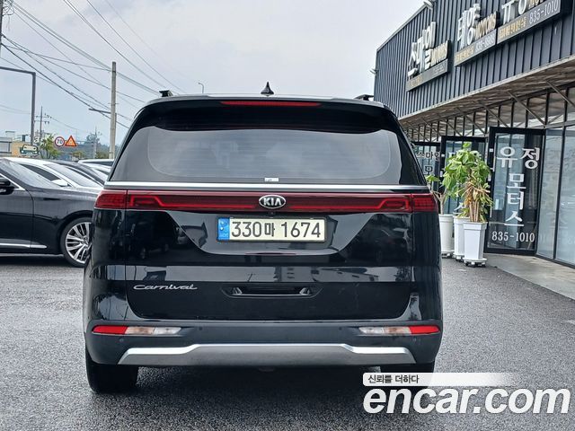 Kia Canival 2021 — photo 17