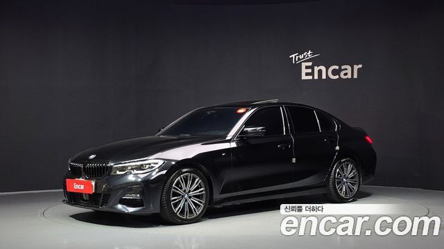 BMW 3-Series 2022 — photo 1