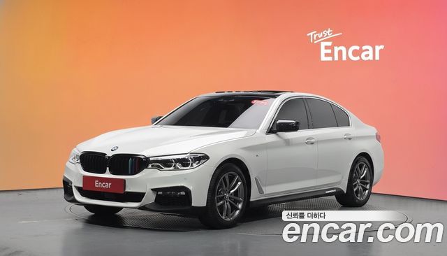BMW 5-Series 2018 — photo 1