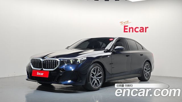 BMW 5-Series 2024 — photo 1
