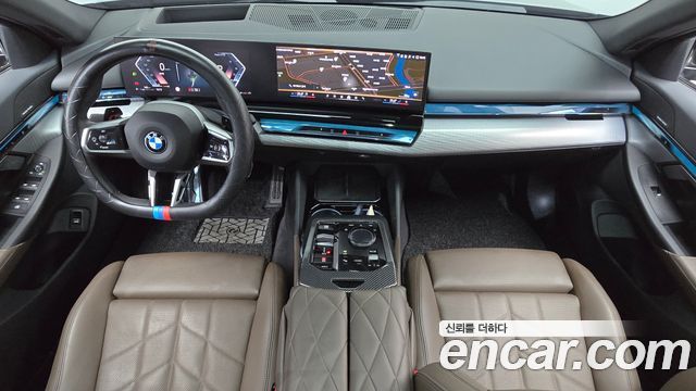 BMW 5-Series 2024 — photo 10