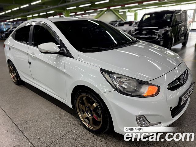 Hyundai Accent 2012 — photo 17