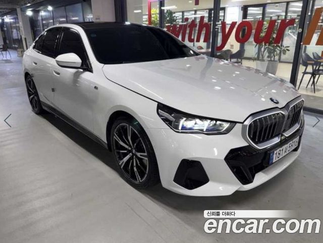 BMW 5-Series 2024 — photo 2