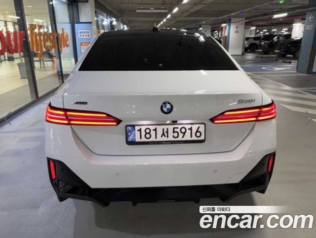 BMW 5-Series 2024 — photo 5