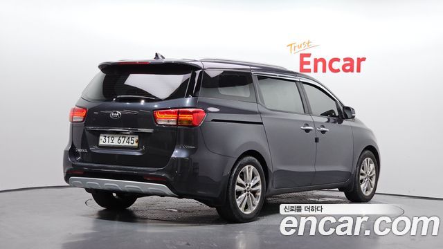 Kia Canival 2015 — photo 2