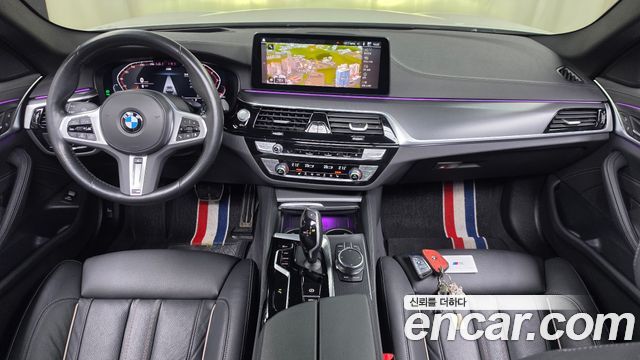 BMW 5-Series 2023 — photo 10