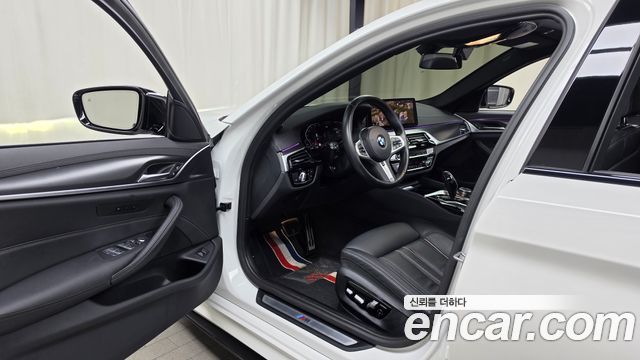 BMW 5-Series 2023 — photo 13
