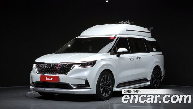 Kia Canival 2023 — photo 1