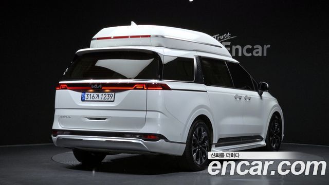 Kia Canival 2023 — photo 2