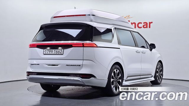 Kia Canival 2021 — photo 2