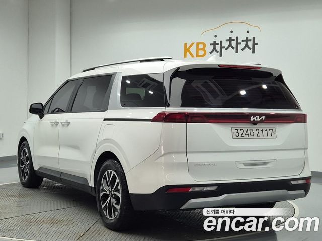 Kia Canival 2023 — photo 2