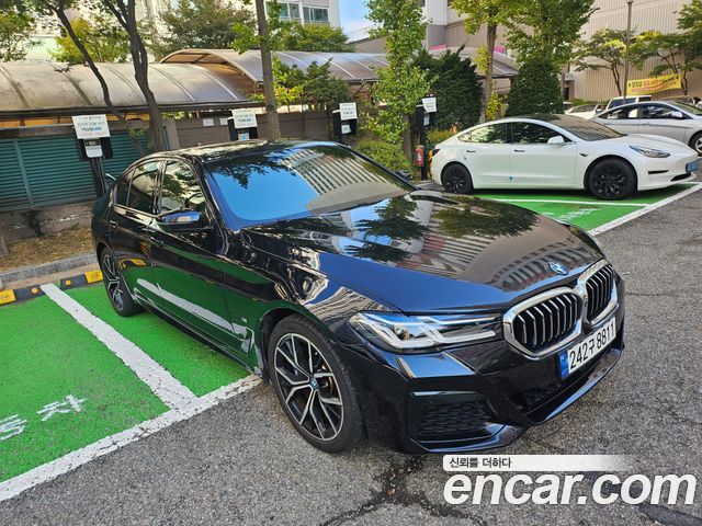 BMW 5-Series 2023 — photo 1