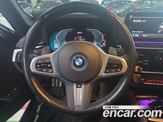 BMW 5-Series 2023 — photo 13