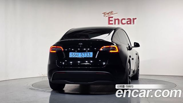 Tesla Model Y 2024 — photo 4