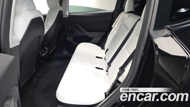 Tesla Model Y 2024 — photo 17