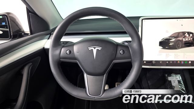 Tesla Model Y 2024 — photo 19